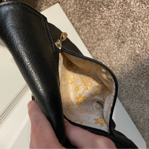 Black Crossbody Purse with Gold colored accents. - Picture 6 of 10
